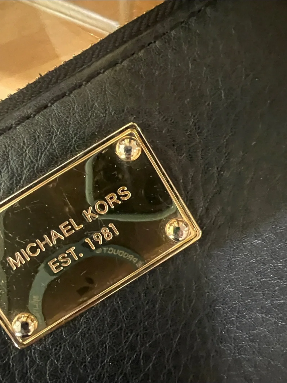 Michael Kors sleek zip